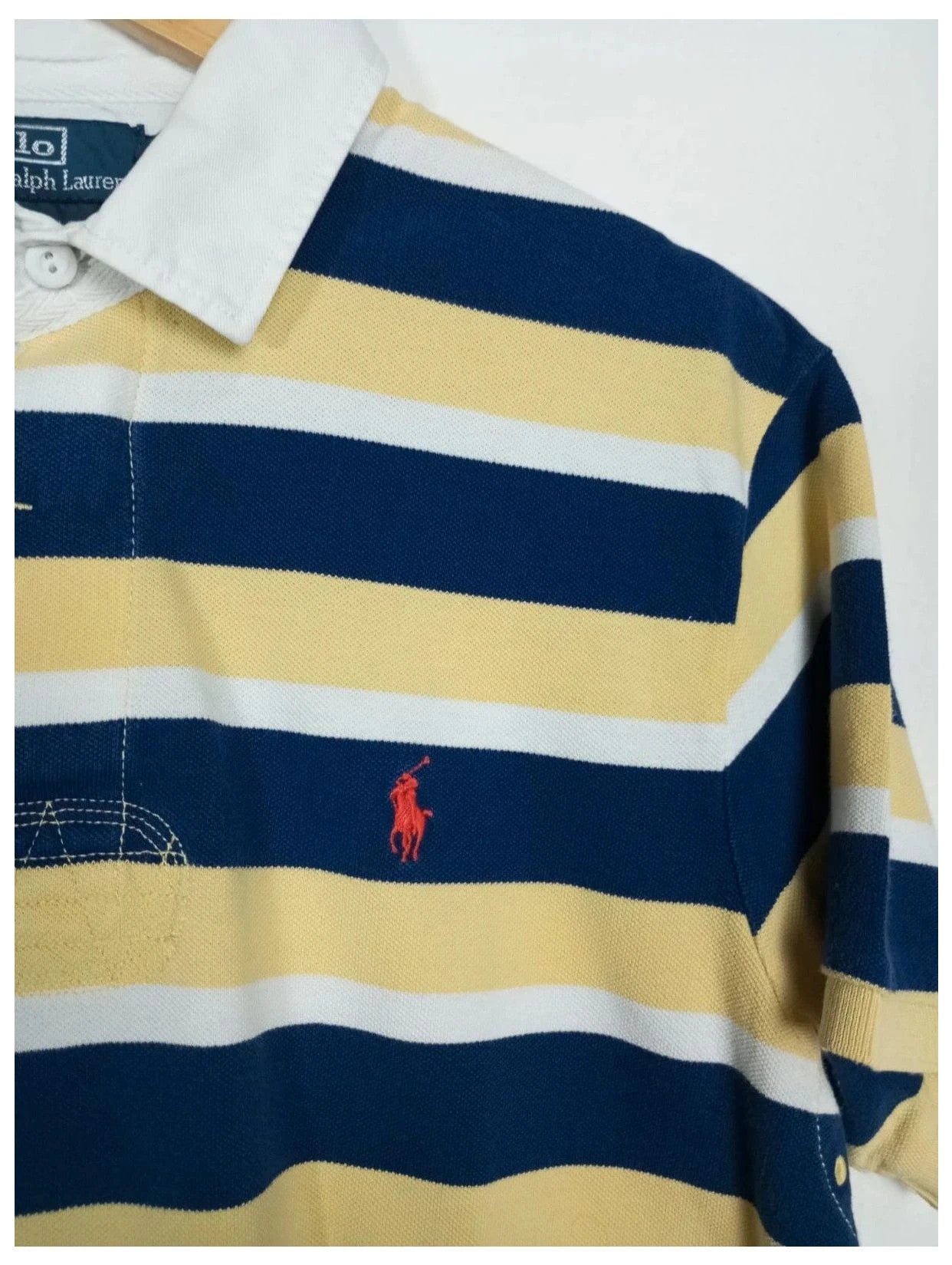 polo by ralph Lauren, rayas amarillo talla L
100% algodón