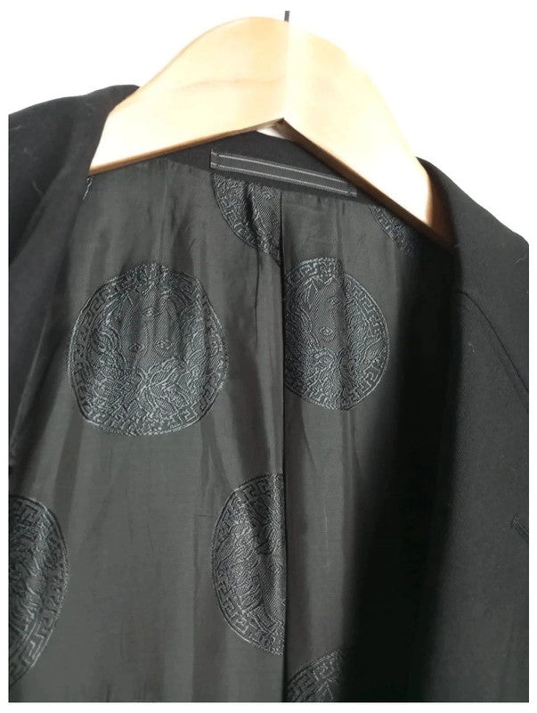chaqueta de traje Versace negra 100% lana. Perfecto estado.