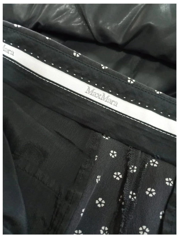 pantalón corto maxmara con flores blancas talla m