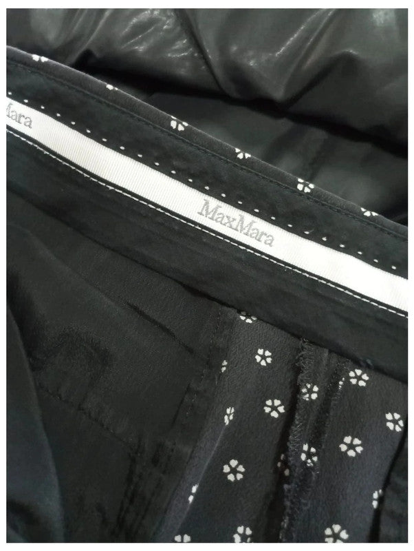 pantalón corto maxmara con flores blancas talla m